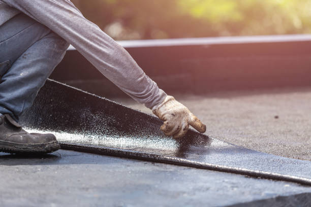 Professional Basement Waterproofing technician working in Hector, NY